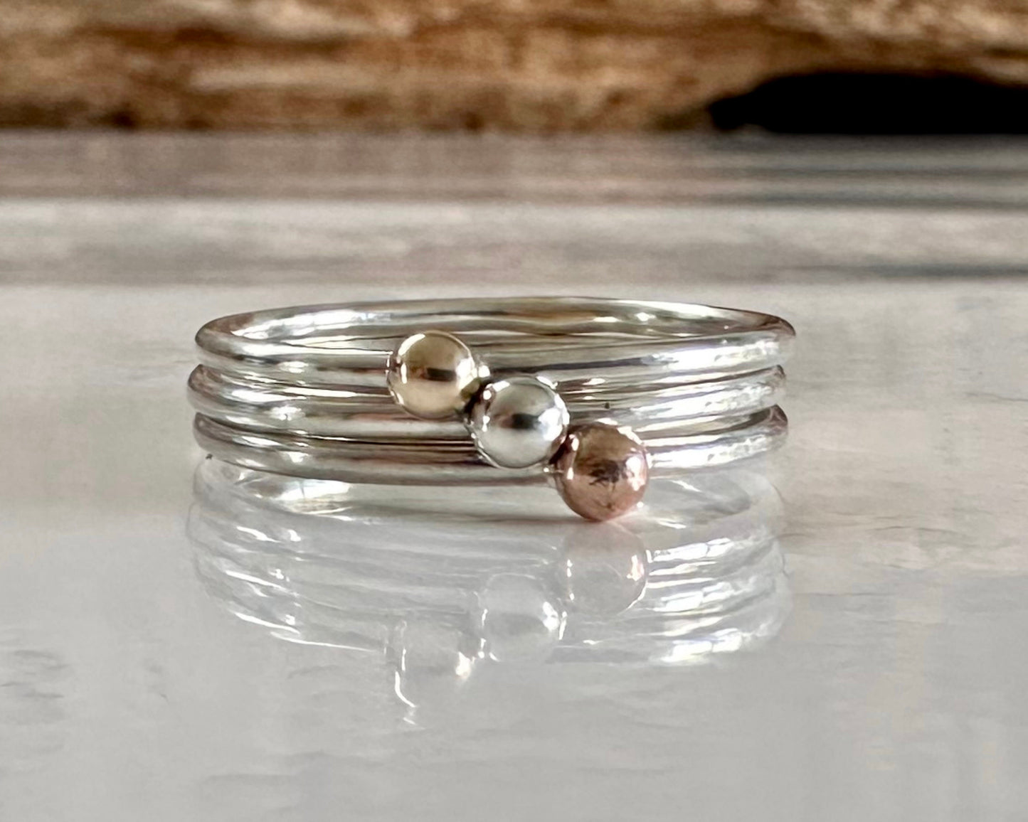 Set of Three Stacking Rings, Solid 9ct Yellow Gold Dot, Solid 9ct Rose Gold Dot, 925 Sterling Silver Dot on 1.3mm 925 Sterling Silver Ring