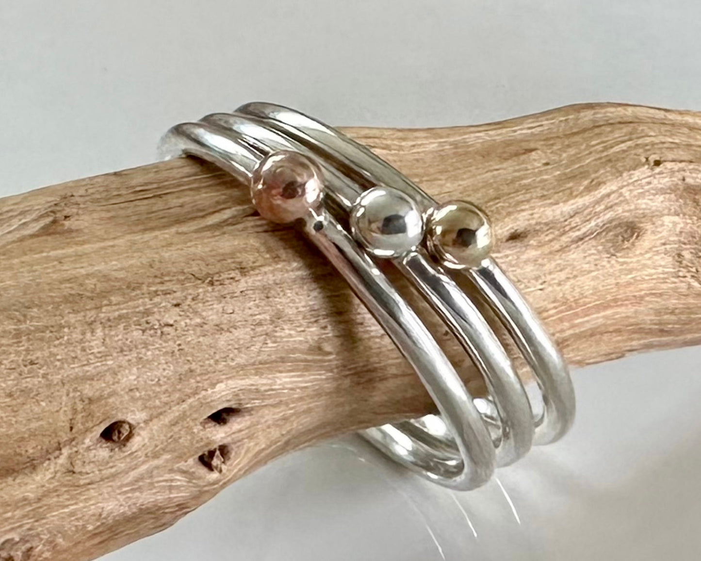 Set of Three Stacking Rings, Solid 9ct Yellow Gold Dot, Solid 9ct Rose Gold Dot, 925 Sterling Silver Dot on 1.3mm 925 Sterling Silver Ring
