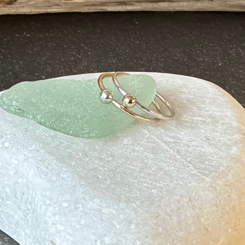 
                  
                    Set of Two Skinny Stacking Rings, 9ct Gold Nugget on 1.2mm 925 Sterling Silver Ring and 925 Sterling Silver Nugget on 1.2mm 9ct Gold Ring
                  
                