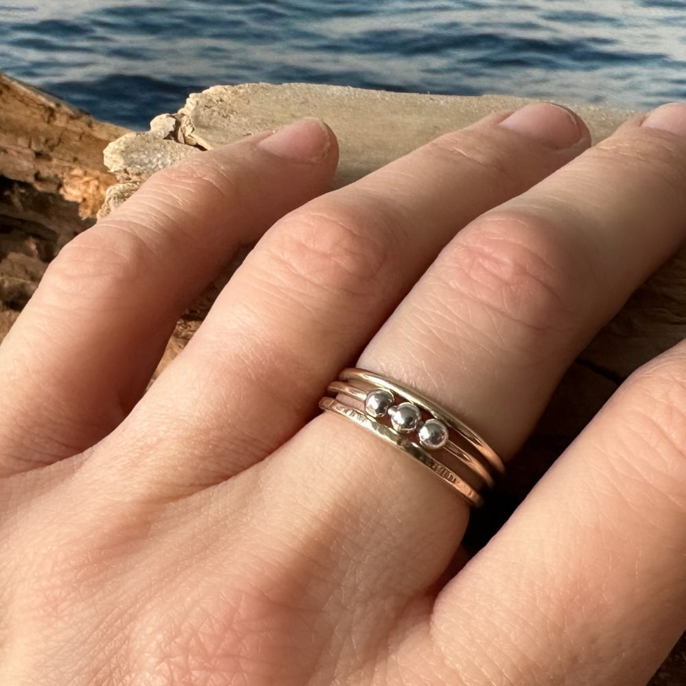 
                  
                    Fidget Ring Handmade from 9ct Gold and Sterling Silver Beads, 1.2mm Gold Stackable Ring Band, Anxiety Ring, Spinner Ring
                  
                