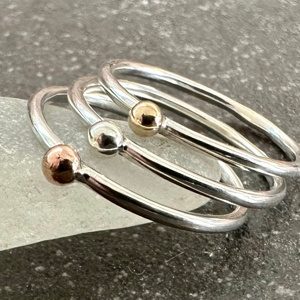 
                  
                    Set of Three Stacking Rings, Solid 9ct Yellow Gold Dot, Solid 9ct Rose Gold Dot, 925 Sterling Silver Dot on 1.3mm 925 Sterling Silver Ring
                  
                