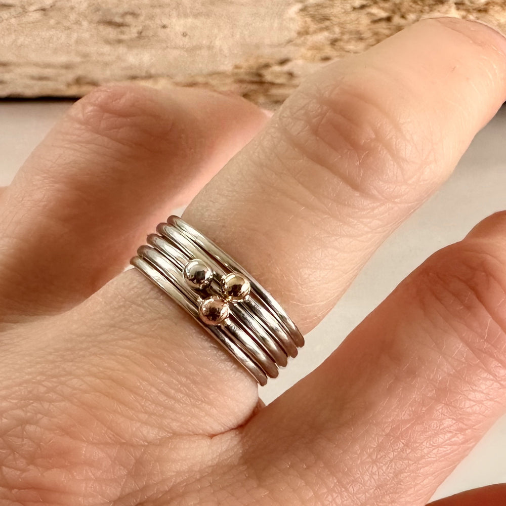 
                  
                    Set of Three Stacking Rings, Solid 9ct Yellow Gold Dot, Solid 9ct Rose Gold Dot, 925 Sterling Silver Dot on 1.3mm 925 Sterling Silver Ring
                  
                