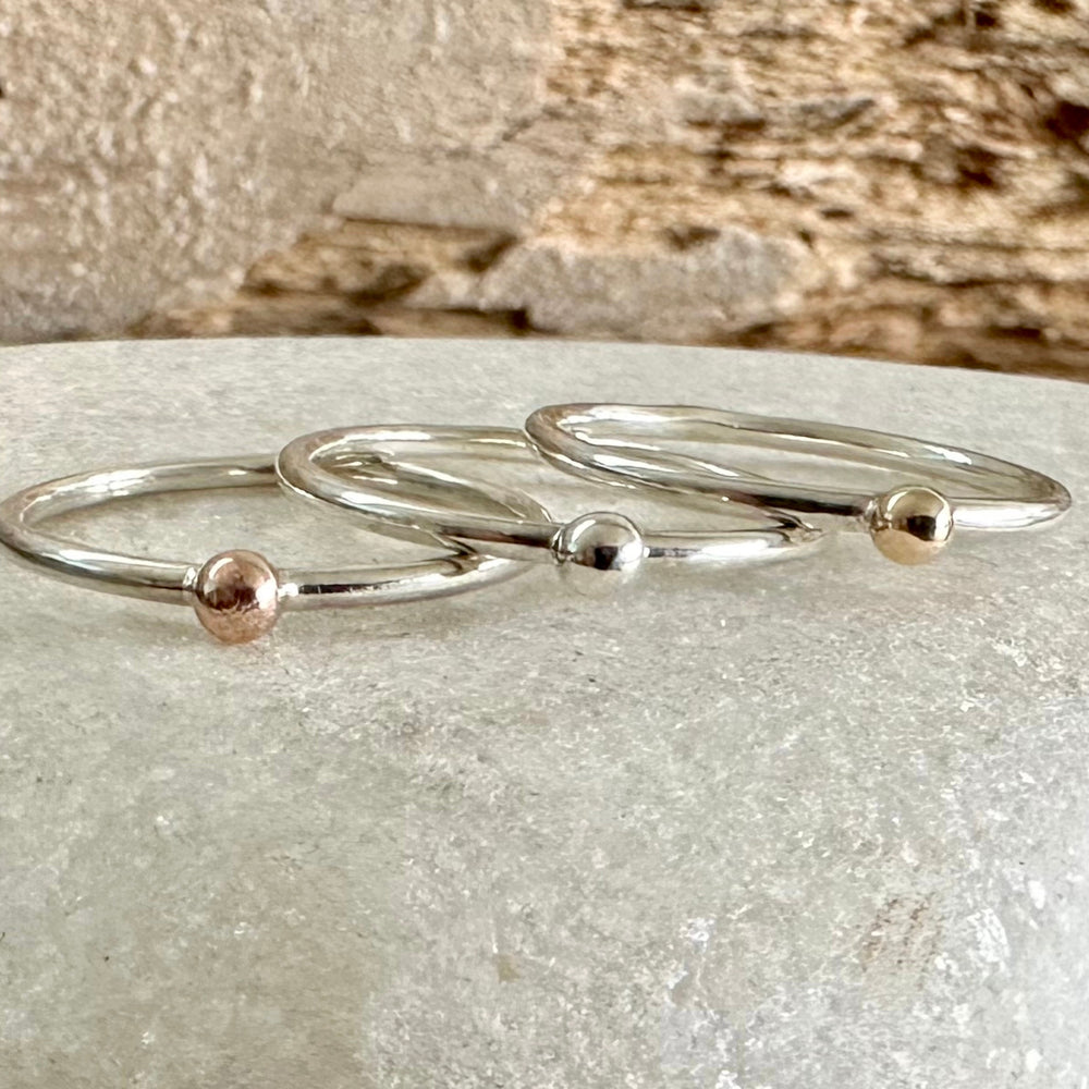 
                  
                    Set of Three Stacking Rings, Solid 9ct Yellow Gold Dot, Solid 9ct Rose Gold Dot, 925 Sterling Silver Dot on 1.3mm 925 Sterling Silver Ring
                  
                