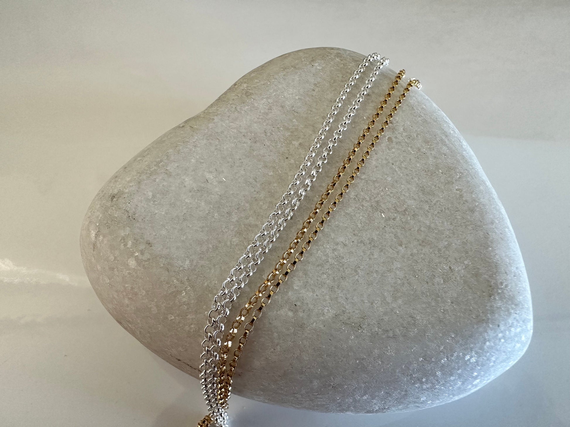 A choice of 16” 1.3mm sterling silver or 14k gold filled belcher chains.