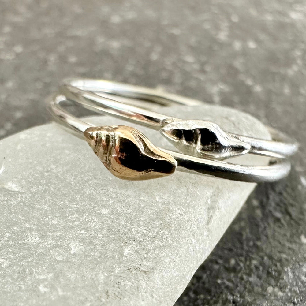 
                  
                    Whelk Shell Stacking Ring, Solid 9ct Gold or Sterling Silver Shell on a 1.2mm 925 Sterling Silver Ring Band, Seashell Ring
                  
                